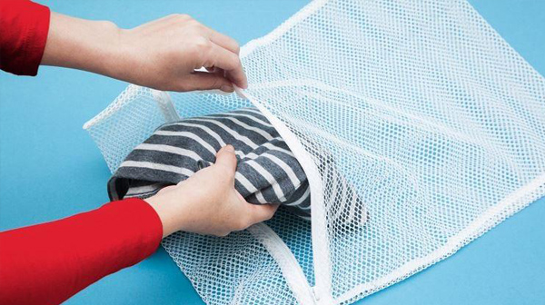 giặt quần áo bằng máy giặt