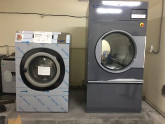 máy giặt là công nghiệp mới